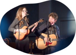 becky and nathan bliss singing and playing guitar