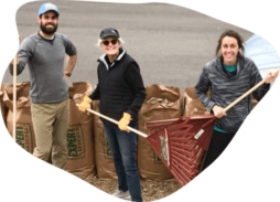 volunteers raking leaves