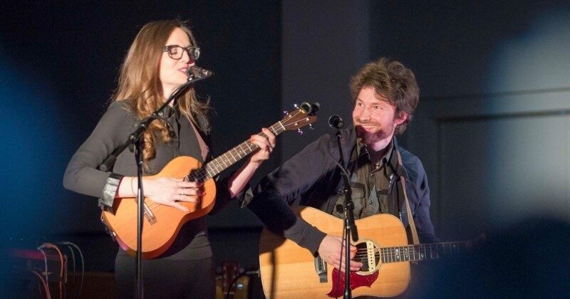 becky and nathan bliss singing and playing guitar